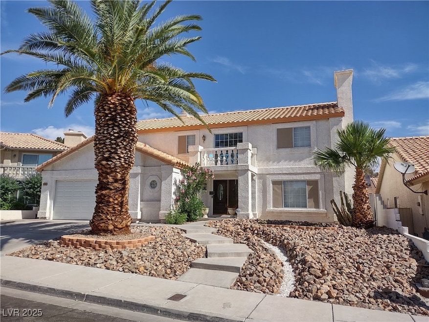 Mediterranean / spanish-style home with a balcony,