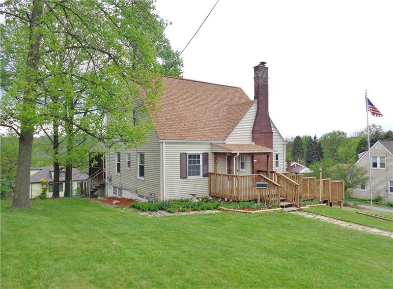 THIS SPACIOUS, 4 BEDROOM HOME IS MUCH ALRGER THAN 