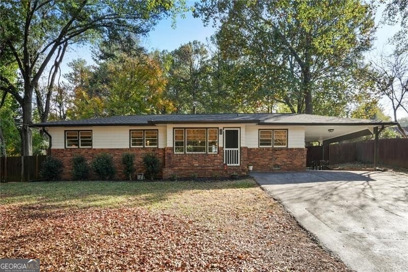 Charming ranch home on .50 acre lot.  New roof!