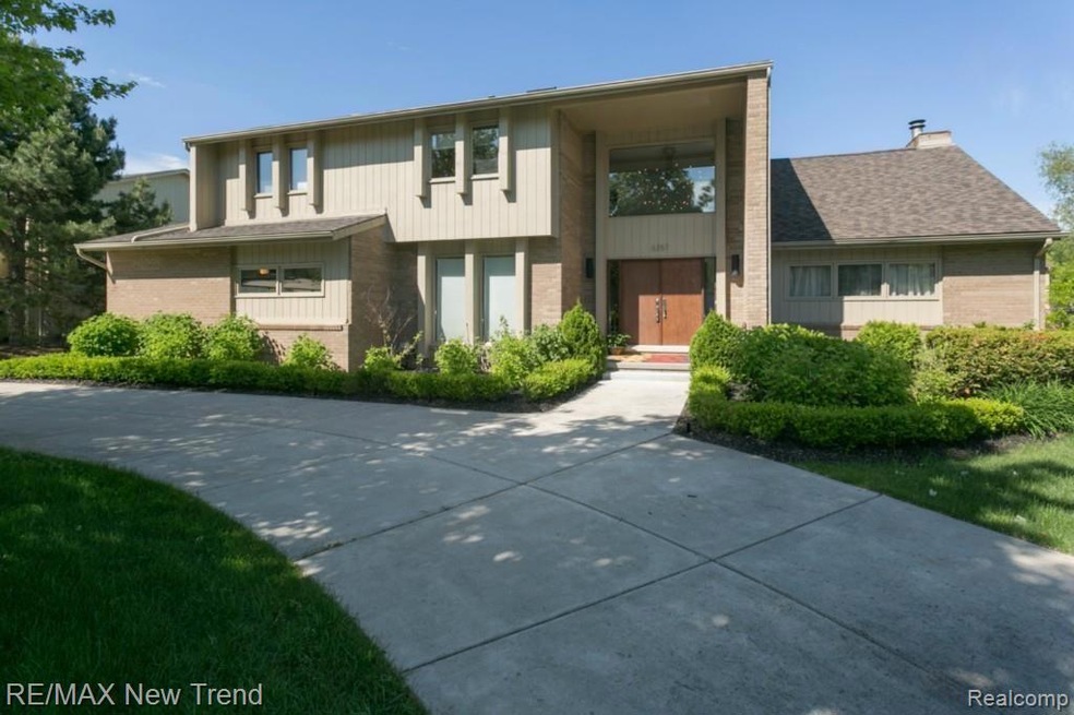 Front Exterior w/ Circular Driveway
