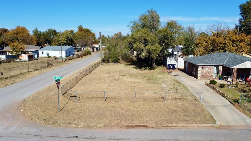 View of asphalt road with a residential view