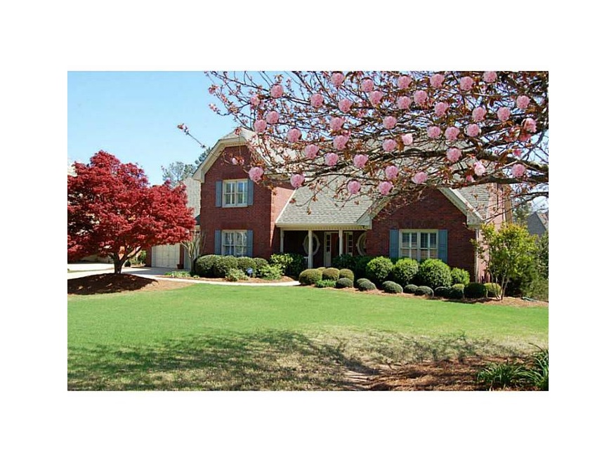 Exterior Front. Custom Built Four Sided Brick Beau