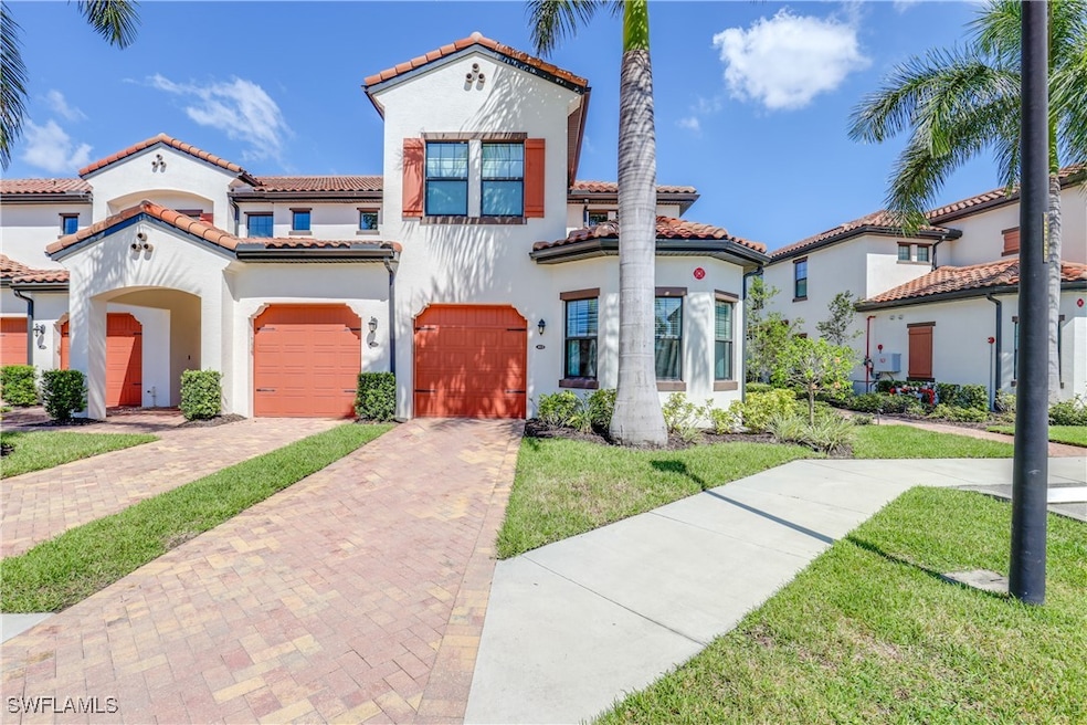 15145 Palmer Lake Cir unit 103, Naples, FL 34109 - photo 1