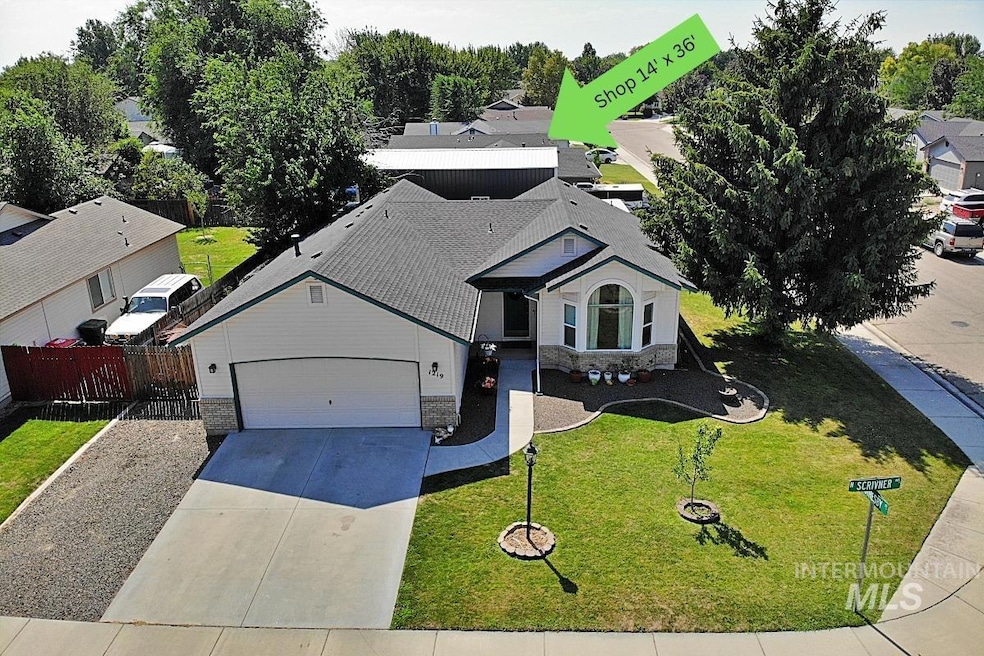 View of front of house featuring a 14x36 powered shop behind