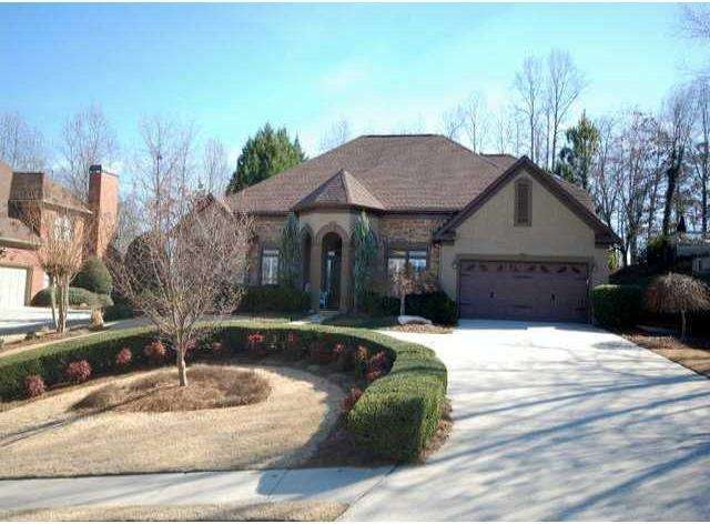 Exterior Front. Elegant hardcoat stucco home resti