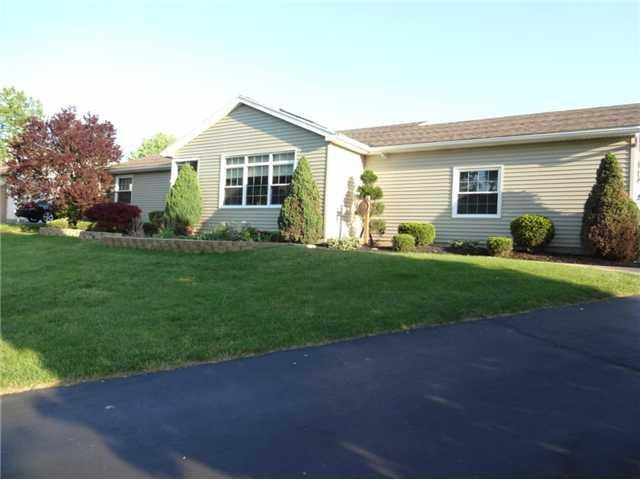 Exterior Front Beautifully Lanscaped Home!!! Maint