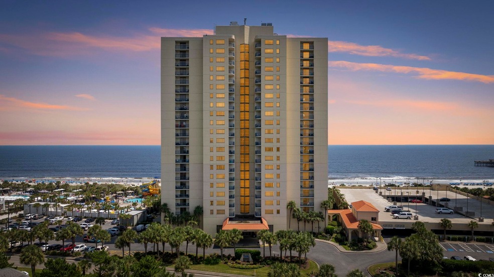 Outdoor building at dusk featuring a water view