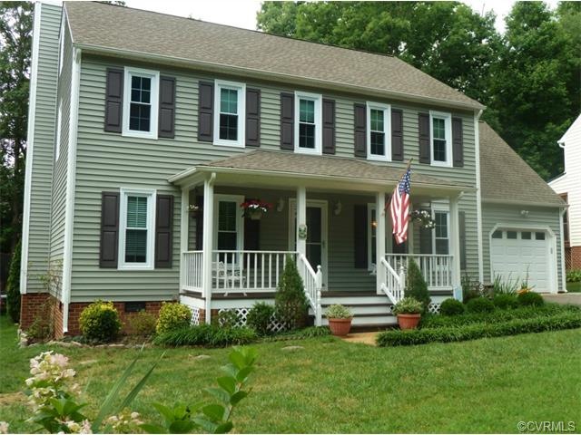 Updated with NEW roof, NEW vinyl siding, NEW vinyl
