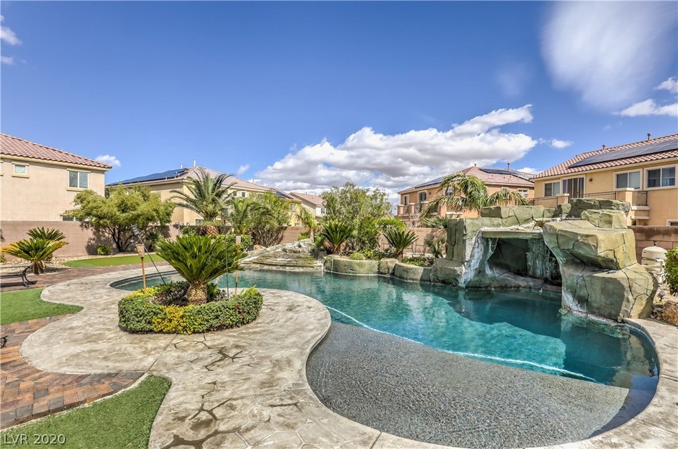 Grotto pool with lava fountain and putting green t
