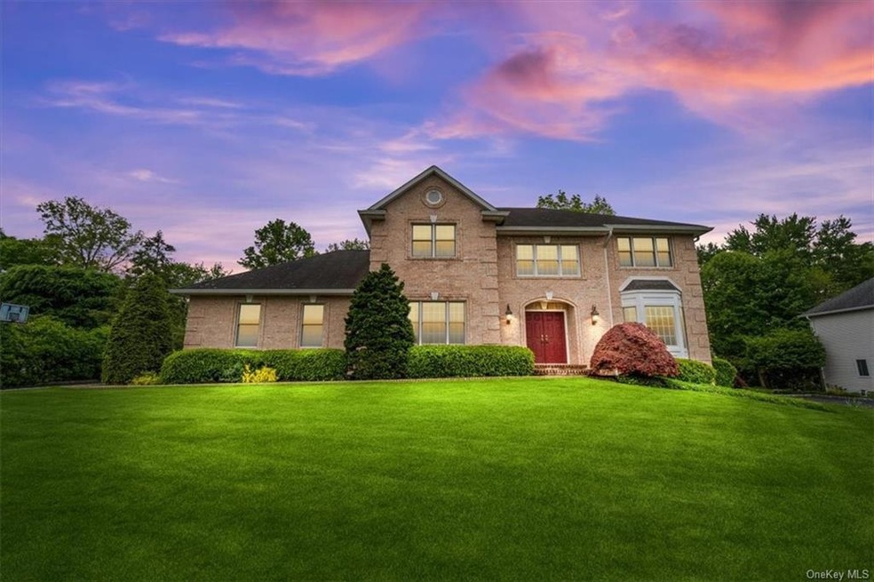 Picture perfect center hall colonial nestled in th