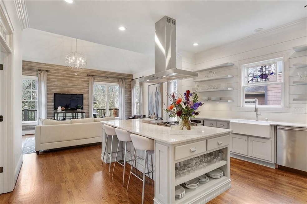 Beautifully renovated kitchen open to living room.