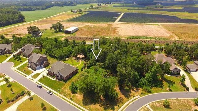 Lot is where the arrow is.  Its .61 acres and has 