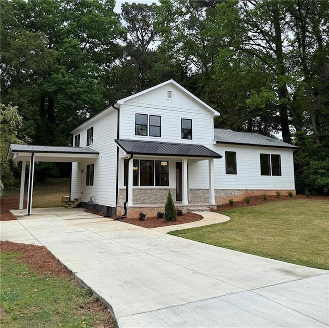 View of front of property with an attached carport