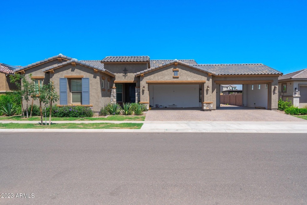 front of house w garage open
