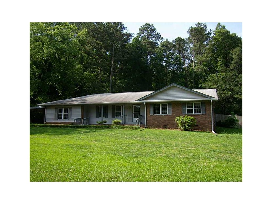 Exterior Front. LARGE BRICK RANCH ON A LEVEL LOT,P