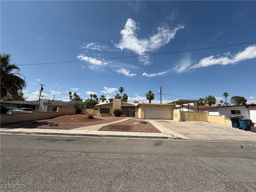 View of front of home featuring concrete driveway,