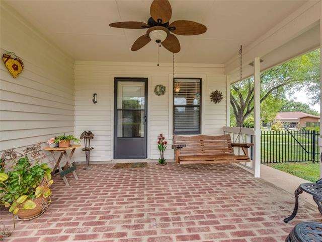Covered patio complete with outdoor fan.