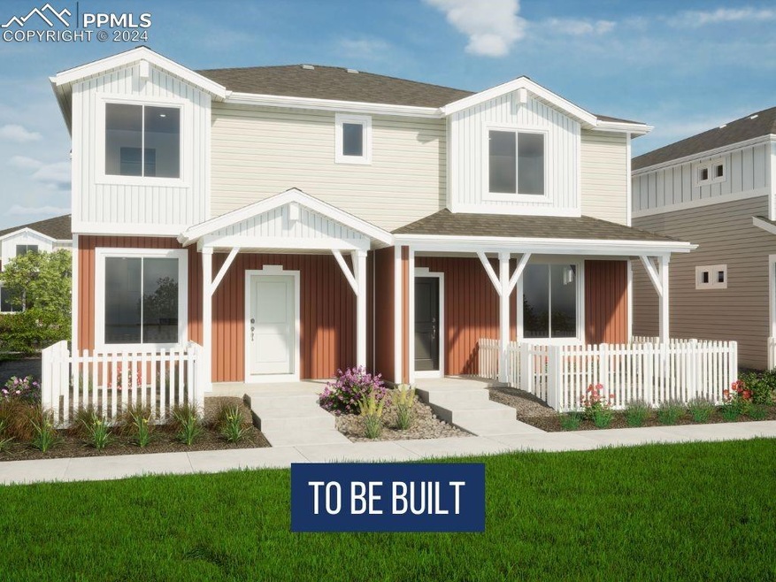 Rear view of property featuring covered porch and 
