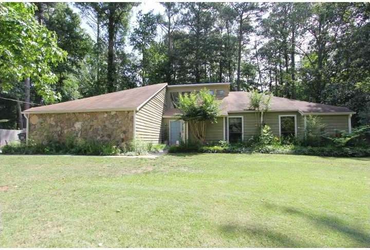 Exterior Front. Beautiful Ranch with lush landscap