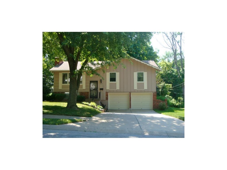 Nice home with large trees, newer windows and gara