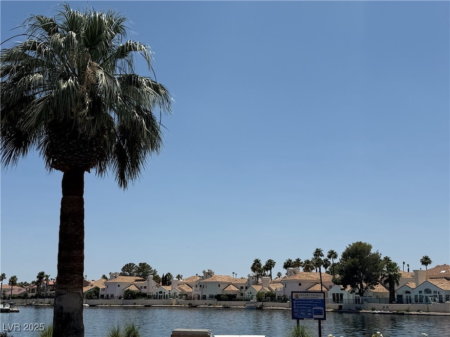 Water view featuring nearby suburban area