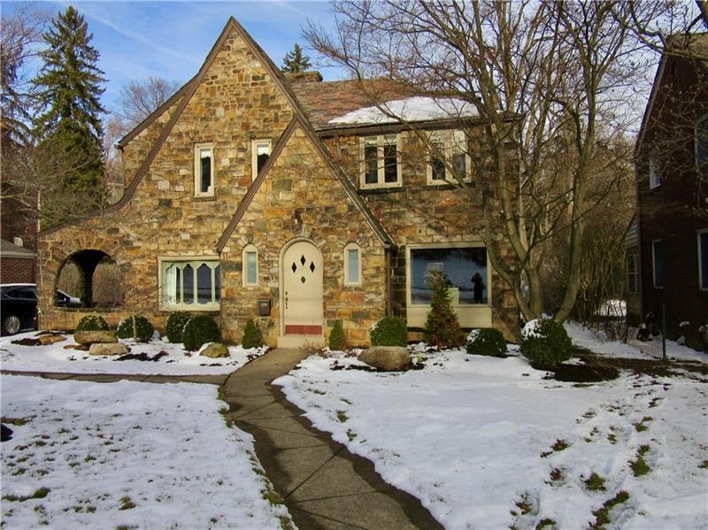 Storybook Tudor on level lot, with a fabulous loca