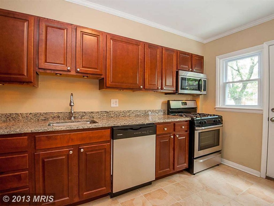 6129 Dunroming Rd, Baltimore, MD 21239 - photo 1