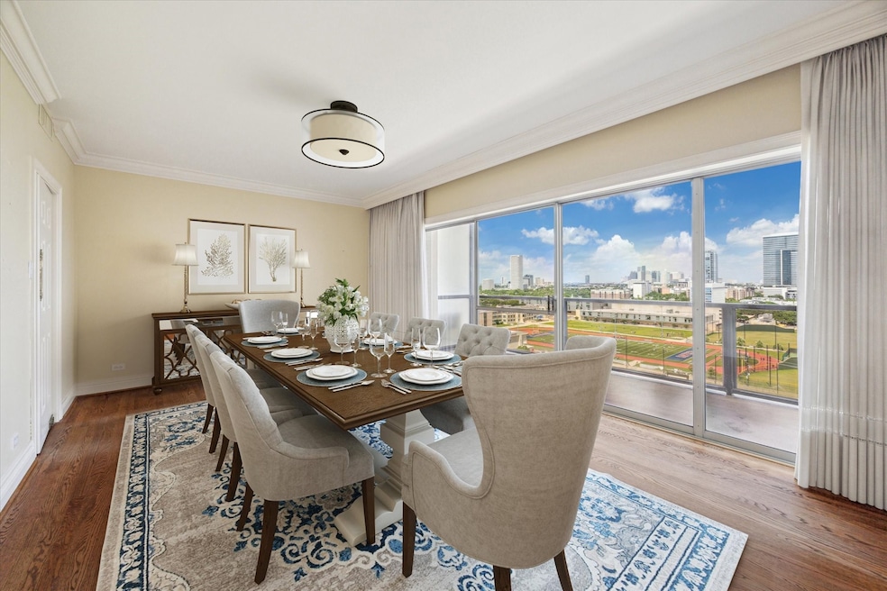 Dining Room with Kitchen to left and Balcony to th