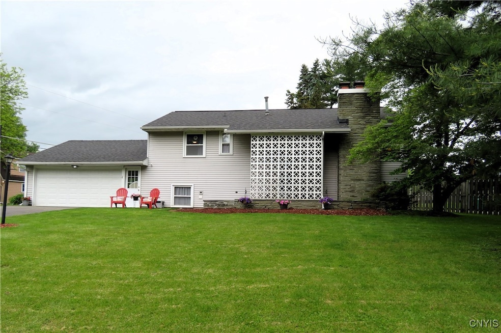 Front Exterior - showing fireplace, front yard and