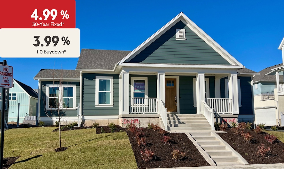 View of front of home featuring covered porch, a front yard, and roof with shingles