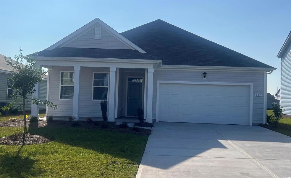 View of front of home featuring a front lawn and a