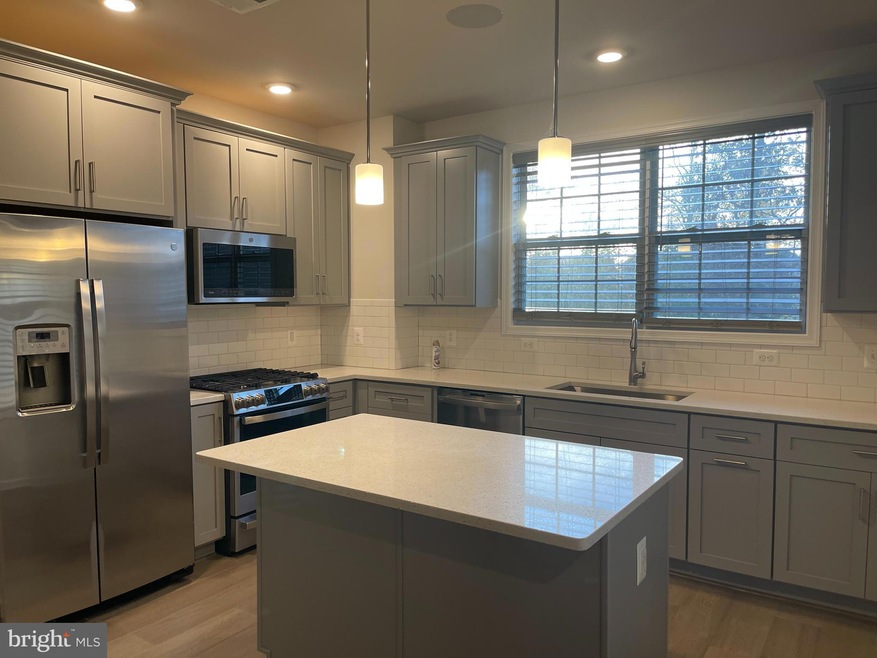 23255 Milltown Knoll Square unit 102, Ashburn, VA 20148 - photo 1