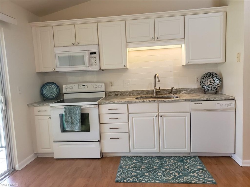 Kitchen has new granite leather finish countertops
