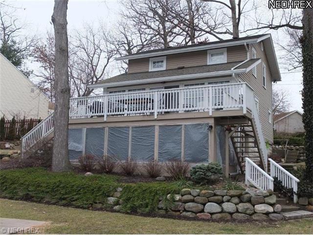 Beautiful lake front home with screened porch and 