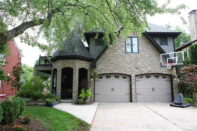 One-of-a-kind stunning Front of the Woods home.
