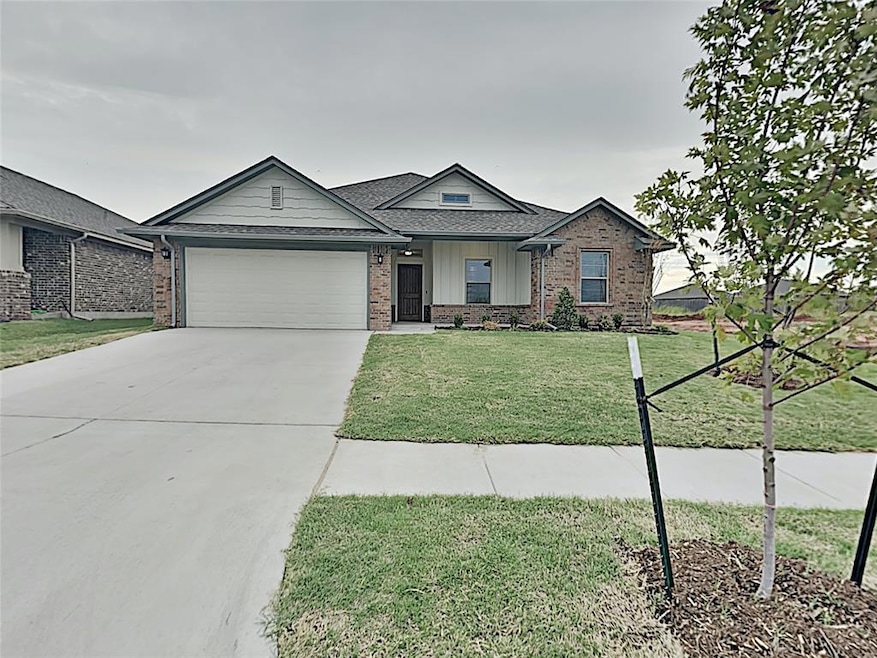 View of front of property featuring brick siding, 