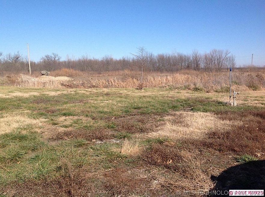 Country living close in. 5 acres, large stocked po