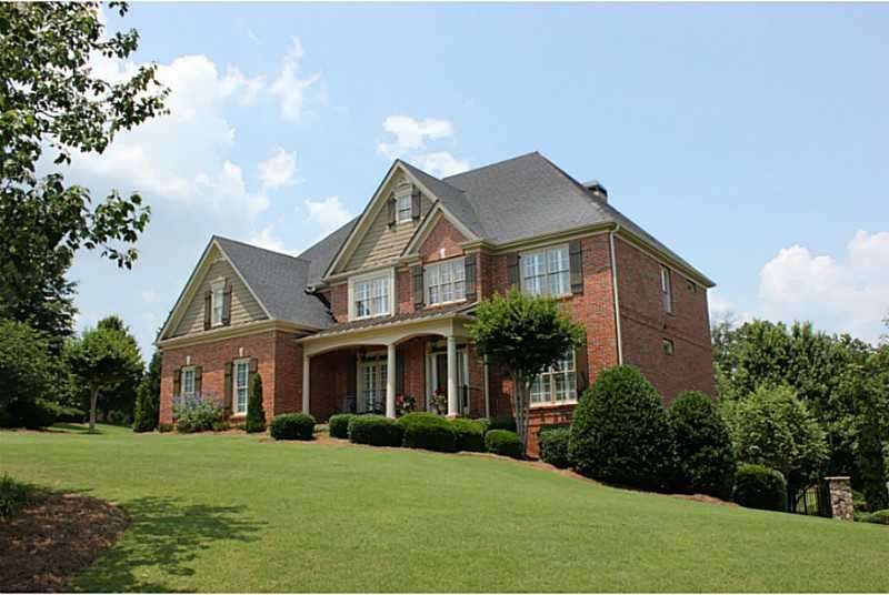 Exterior Front. Stunning Brick Home with Rocking C