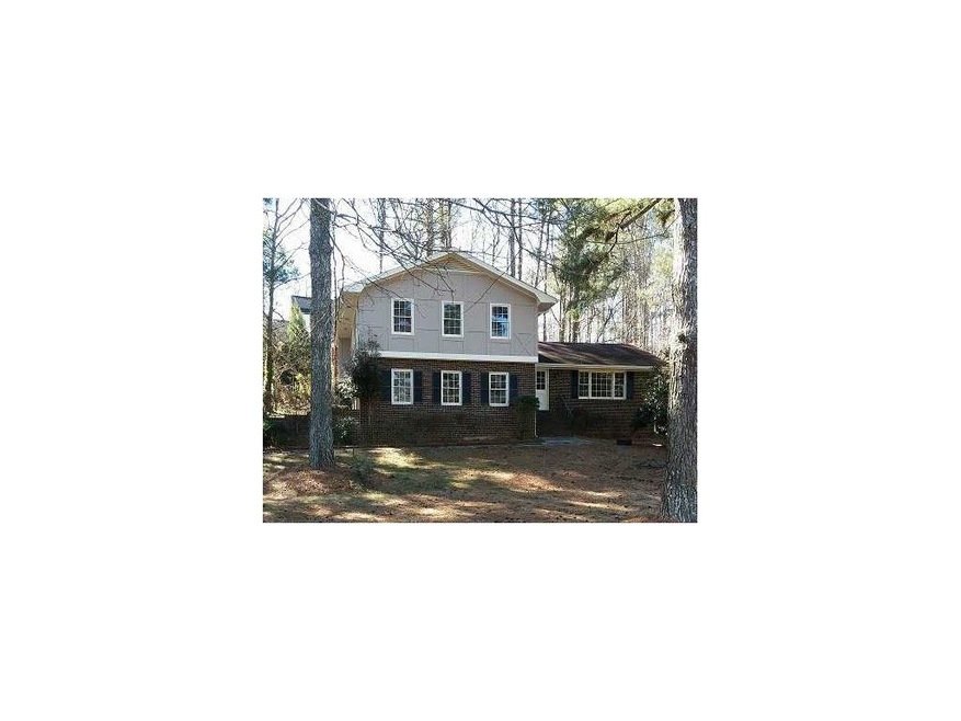 5812 Covered Wagon Trail SW, Lilburn, GA 30047 - photo 1