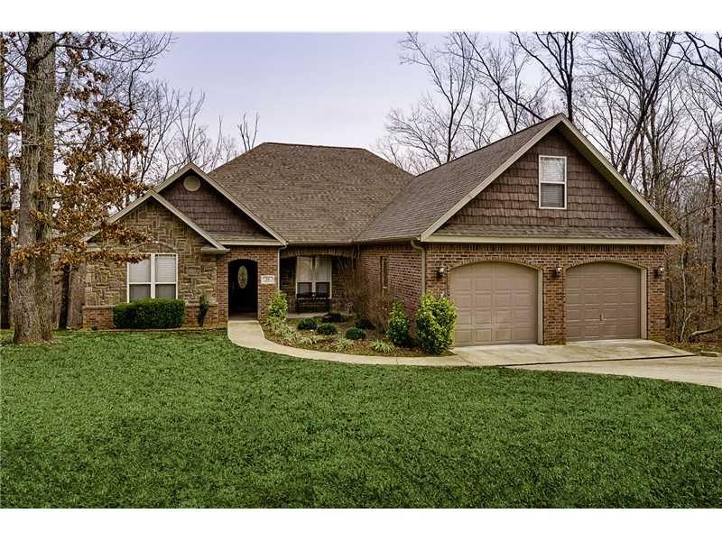 Exterior Front. Tons of beauty found in this open, flowing plan offering over 2700 htsqft of easy living