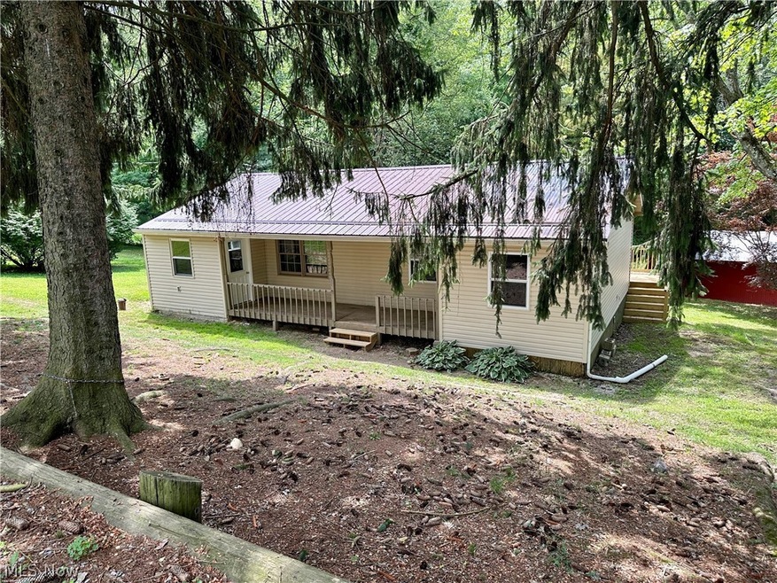 Ranch-style house with covered porch