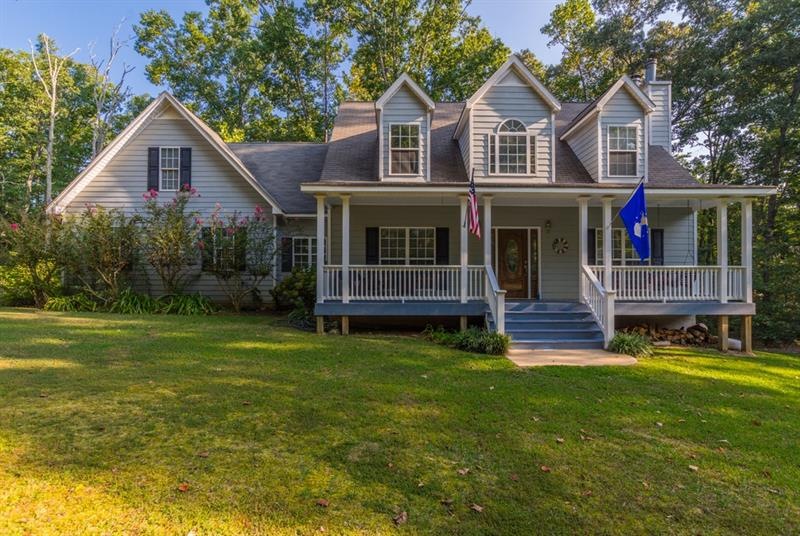 Gorgeous Cape Cod Home on 5 Acres.