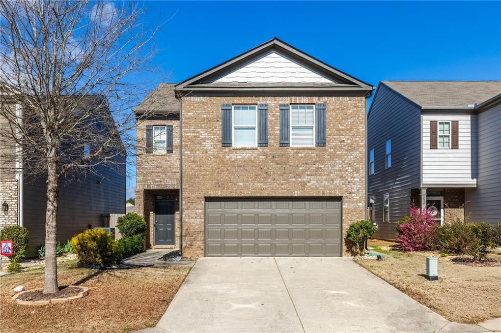 Traditional brick front home on level fenced homes