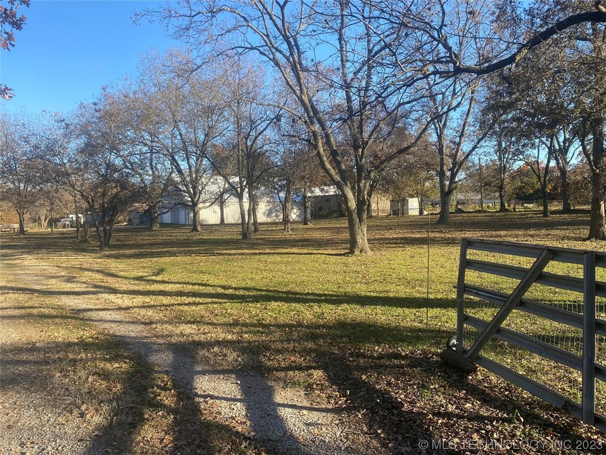 Enter 2.5 acres wooded lot.