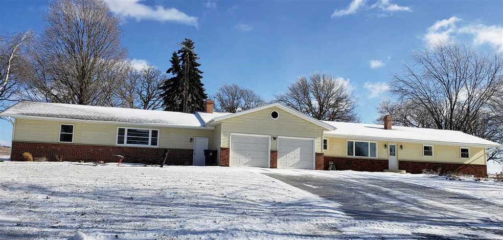 Attached huge workshop on left side of garage