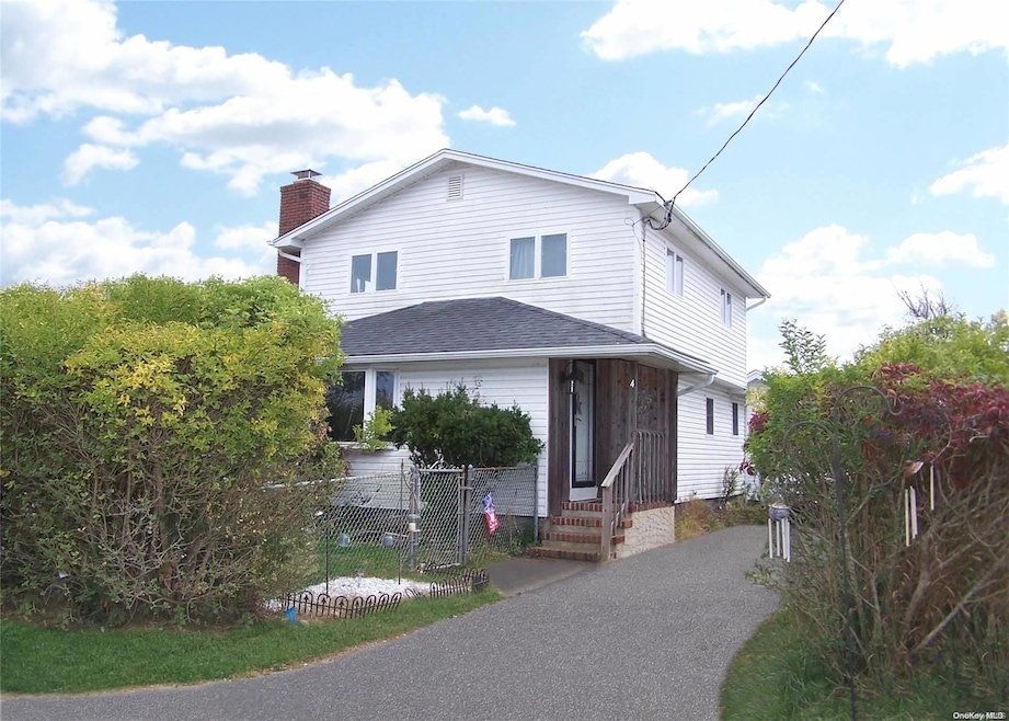 4 Quail Rd, Mastic Beach, NY 11951 - photo 1