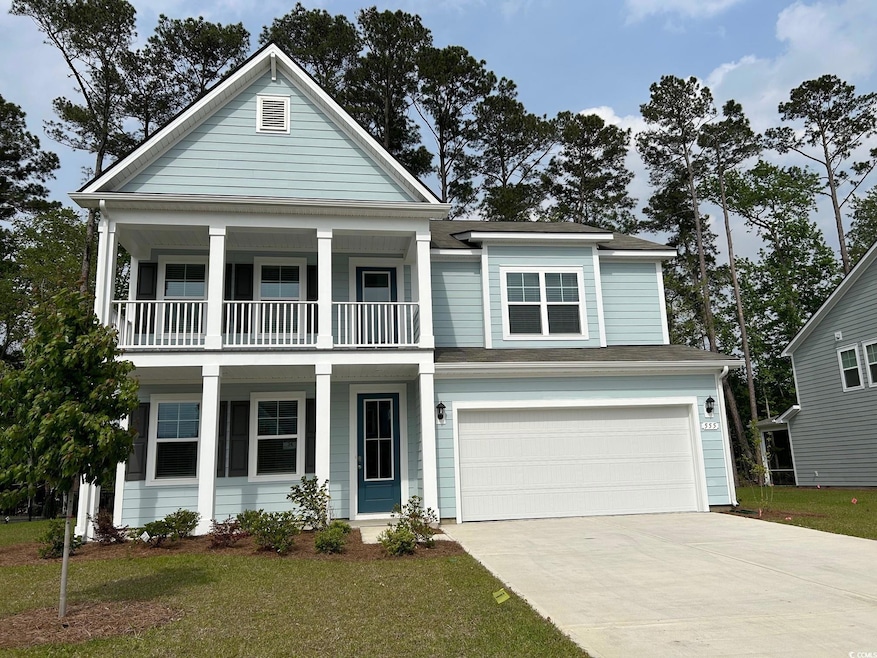 Greek revival inspired property with driveway, a b