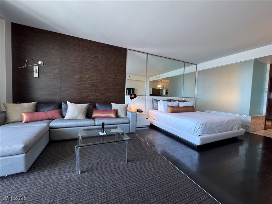 Bedroom with wood finished floors