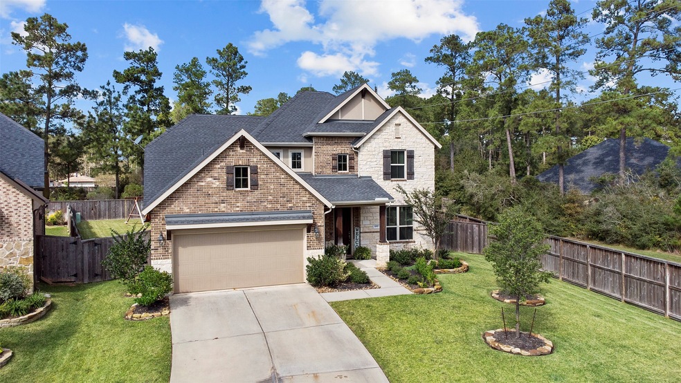 1087 Ginger Glade Ln, Pinehurst, TX 77362 - photo 1