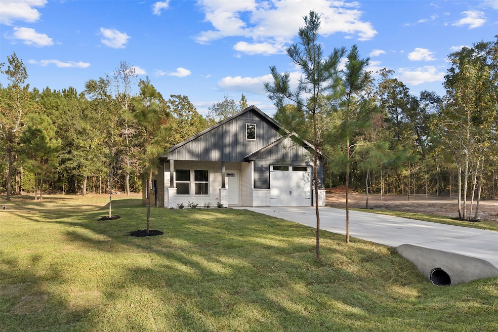 15119 Arrowhead Loop E, Willis, TX 77378 - photo 1